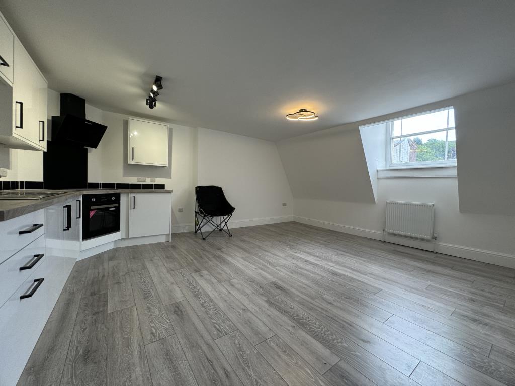 Lot: 155 - TWO-BEDROOM TOP FLOOR FLAT IN CENTRAL LOCATION - Living room/kitchen and dining room